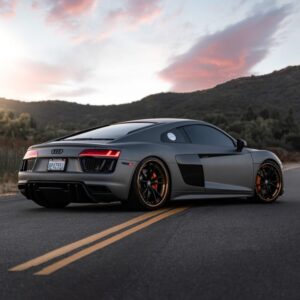 A Stylish Grey Colour Parked In Amazing Background automobile industry in India